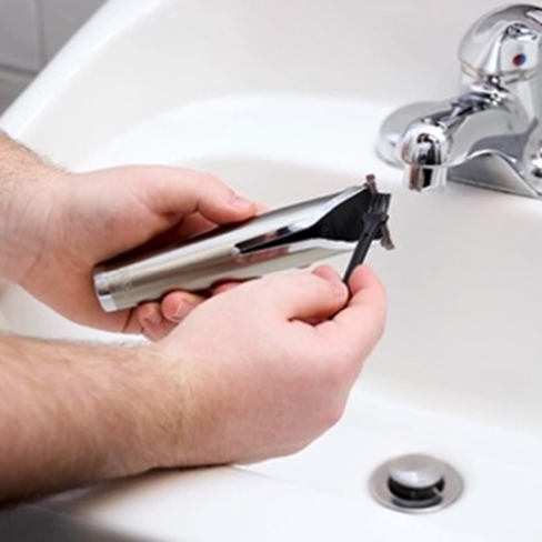Graphic of a trimmer and blades that reads "Maintaining Your Trimmer"