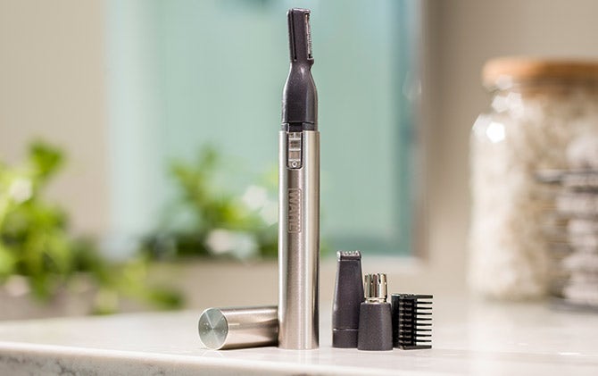 A Wahl ear, nose and brow trimmer with head attachments.