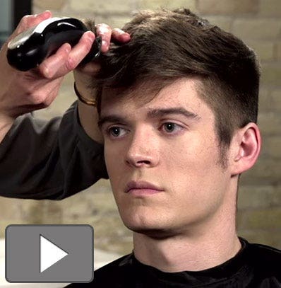 A man getting haircut with a Wahl clipper.